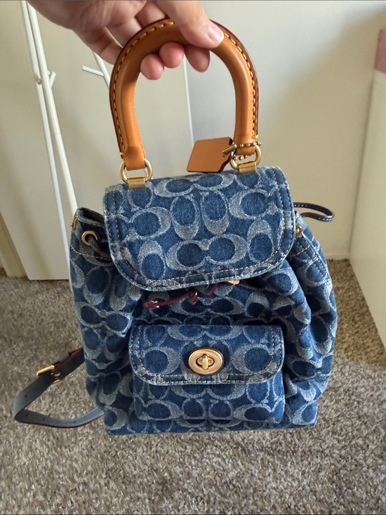 Coach Handbags - Coach Blue Denim Signature Mini Backpack with Tan Leather Handle